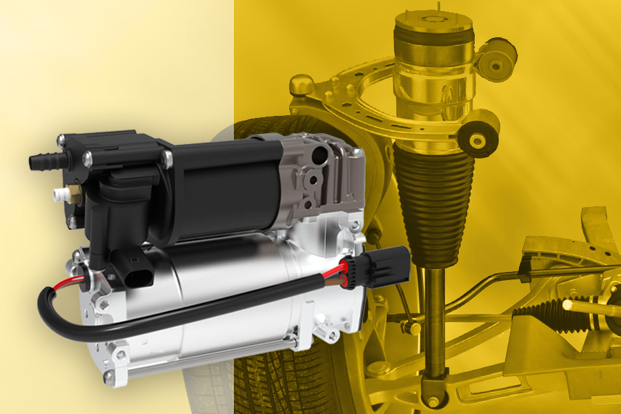 Magneti Marelli Parts & Services air suspension compressor in the foreground, with wheel, axle and air suspension system in the background to contextualise the application of the component